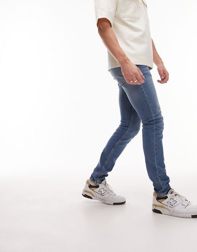 Jeans skinny elasticizzati lavaggio medio - Topman - Modalova