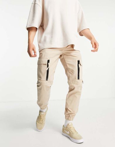 Pantaloni cargo skinny color pietra con zip - Topman - Modalova