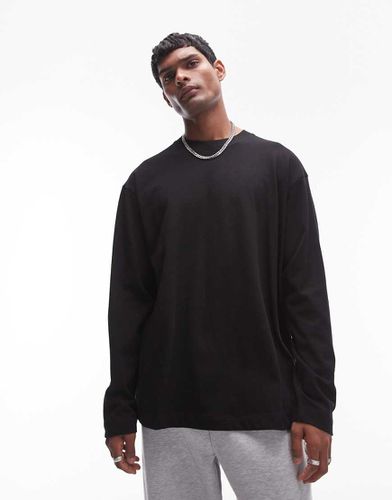 T-shirt stile skater a maniche lunghe oversize nera con cuciture a vista - Topman - Modalova