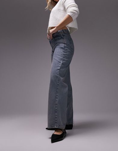 Topshop - Hourglass - Jeans a vita bassa con cinturino sul retro effetto candeggiato vintage - Topshop Hourglass - Modalova
