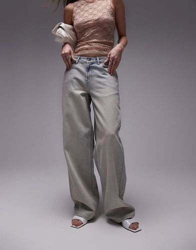 Jeans con cinturino sul retro lavaggio candeggiato sporco - Topshop - Modalova