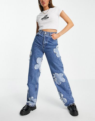 Mom jeans oversize medio con applicazioni di fiori - Topshop - Modalova