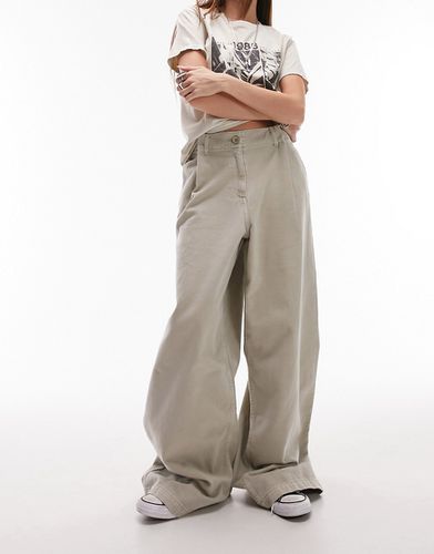 Pantaloni a fondo ampio taglio lungo beige con pinces in vita - Topshop - Modalova