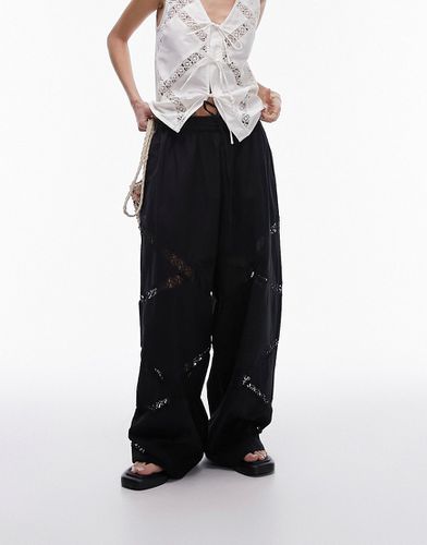 Pantaloni elasticizzati a fondo ampio neri in lino con inserto in pizzo - Topshop - Modalova