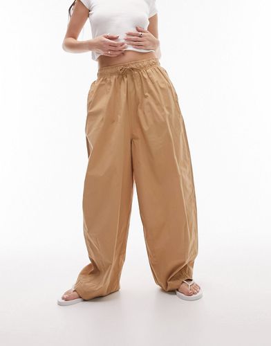 Pantaloni oversize a palloncino in cotone color cammello - Topshop - Modalova