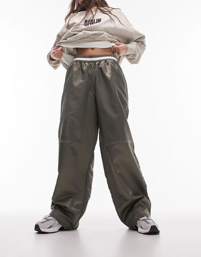 Pantaloni stile basket con fascia in vita in jersey di nylon color kaki - Topshop - Modalova