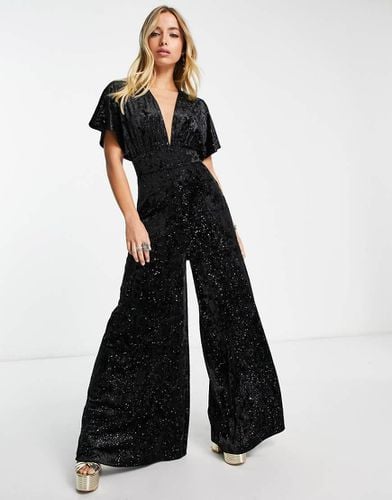 Tuta jumpsuit a fondo ampio in velluto glitterato - Twisted Wunder - Modalova