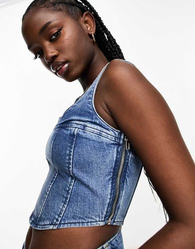 Top a corsetto in denim - Urban Revivo - Modalova