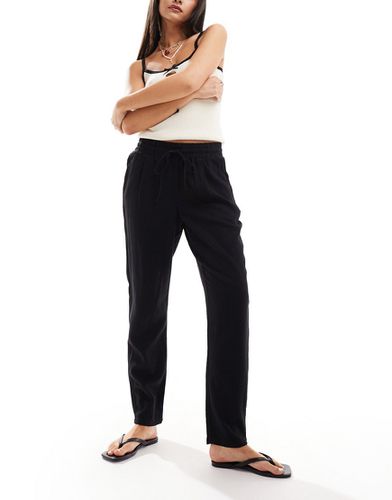 Pantaloni affusolati neri in misto lino - Vero Moda - Modalova