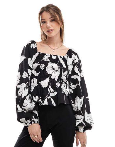 Top a punto smock monocromatico a fiori con maniche a palloncino - Vero Moda - Modalova