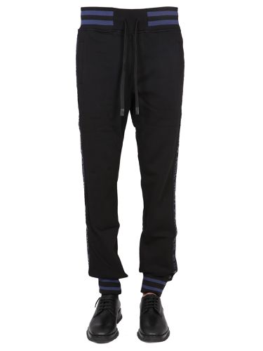 Jogging pants with elastic - versace jeans couture - Modalova