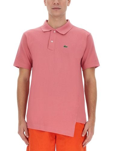 Polo x lacoste - comme des garcons shirt - Modalova