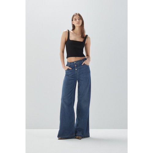 Jeans flare a vita bassa con tre bottoni - Please - Modalova