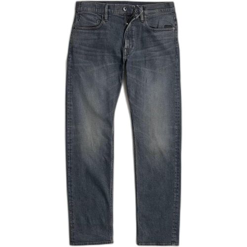 Il jeans Mosa presenta una vestibilità dritta con gamba stretta. Questo jeans in denim elasticizzato è dotato di una patta con zip.Patta con zipTasc - MAG11206736 - Modalova