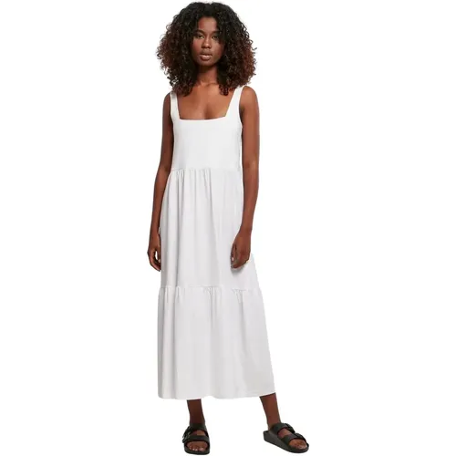 Un abito leggero ed estivo dalla forma trendy. Sul retro e sul davanti, l'abito da donna presenta un profondo scollo a barca angolare e spalline largh - MAG5699892 - Modalova