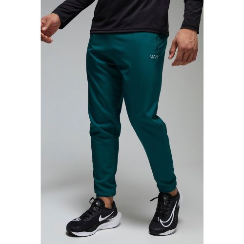 Pantaloni tuta affusolati Man Active Gym - boohoo - Modalova