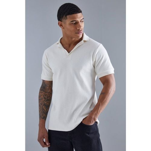 Polo Slim Fit a coste con rever - boohoo - Modalova