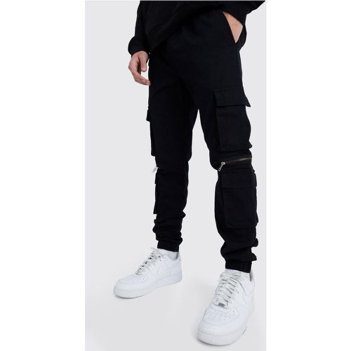 Pantaloni Cargo con tasche multiple, zip e vita elasticizzata - boohoo - Modalova