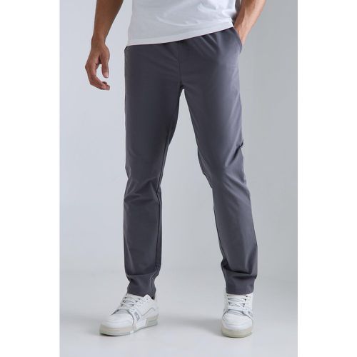 Pantaloni Slim Fit in Stretch tecnico leggero con vita elasticizzata - boohoo - Modalova