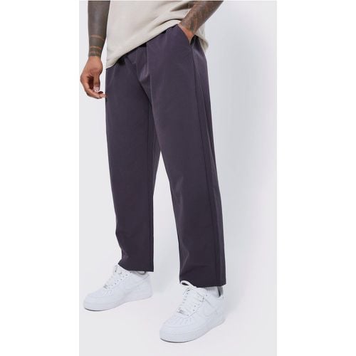 Pantaloni alla caviglia rilassati in Stretch tecnico leggero elasticizzato - boohoo - Modalova