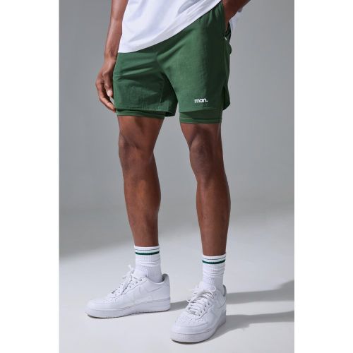 Pantaloncini Man Sport 2 in 1 da 12 cm con spacco laterale - boohoo - Modalova