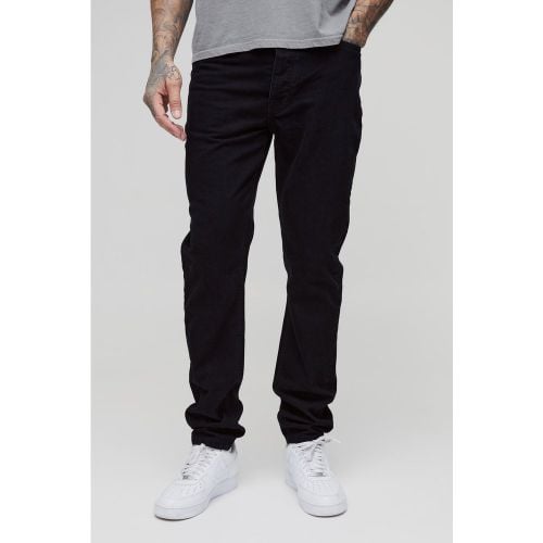 Jeans Tall Slim Fit in denim rigido - boohoo - Modalova