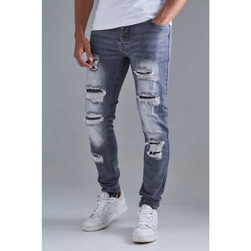 Skinny Stacked Distressed Ripped Jeans In Grey - boohoo - Modalova