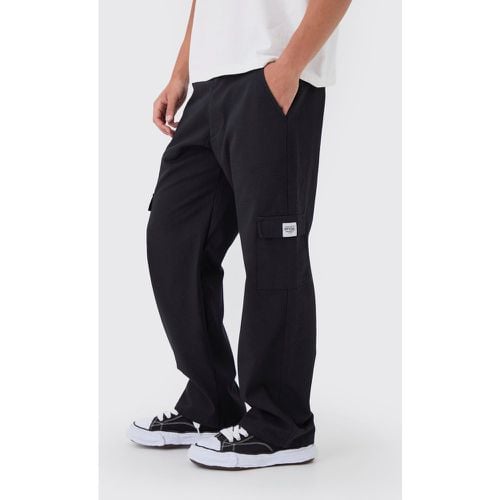 Pantalón Holgado Cargo De Tela Con Cintura Fija Y Etiqueta - boohoo - Modalova