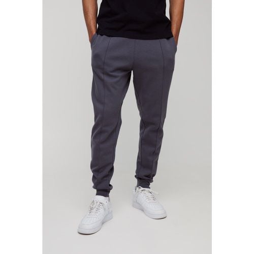 Pantaloni tuta Slim Fit affusolati pesanti Super Clean in maglia interlock - boohoo - Modalova