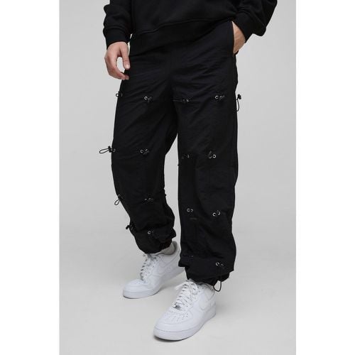 Pantaloni rilassati in nylon effetto goffrato con elastico in vita - boohoo - Modalova