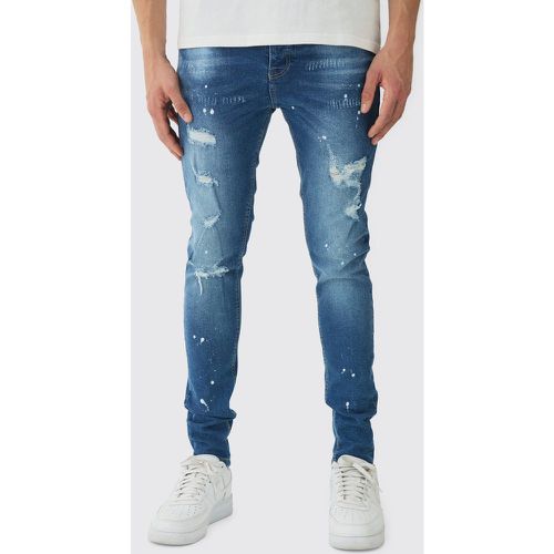 Jeans Skinny Fit in Stretch con strappi & rattoppi e schizzi di colore - boohoo - Modalova