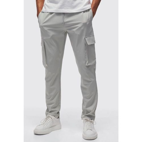 Pantaloni Cargo in Stretch tecnico Slim Fit con laccetti sul fondo - boohoo - Modalova