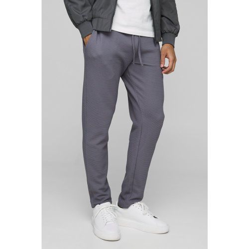 Cropped Tapered Textured Jogger - boohoo - Modalova