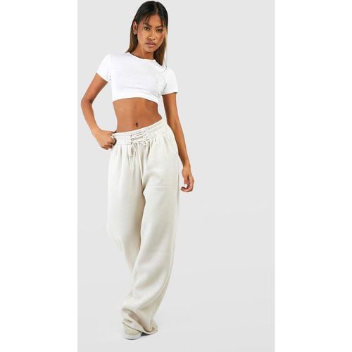 Pantaloni tuta a gamba ampia stile corsetto con laccetti - boohoo - Modalova