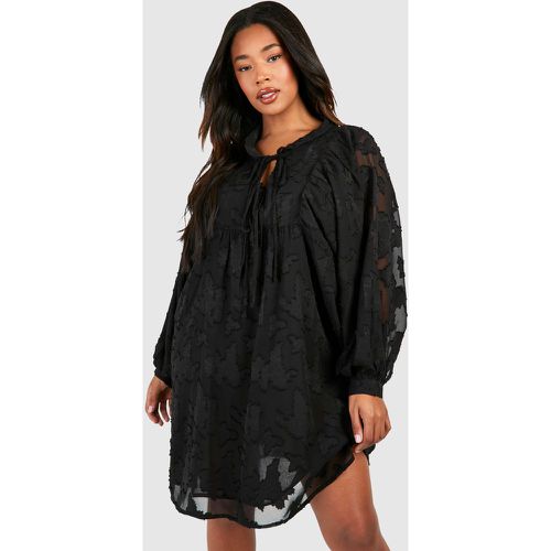 Miniabito Plus Size a maniche lunghe in rete in burnout con collo alto - boohoo - Modalova