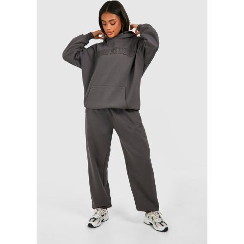 Pantaloni tuta oversize Dsgn Studio Self con applique in tessuto - boohoo - Modalova