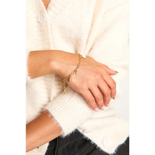 Bracciale con pendente a forma di fiore e stella - boohoo - Modalova