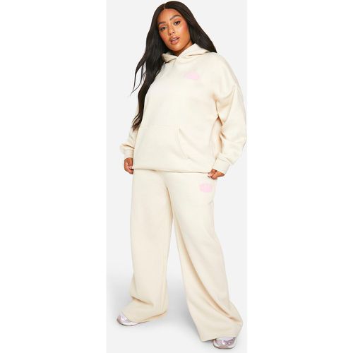 Pantaloni tuta dritti Plus Size con stampa Dsgn Studio Sport a caratteri arrotondati - boohoo - Modalova