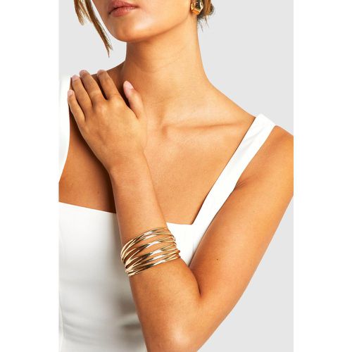 Bracciale rigido color oro con cut-out - boohoo - Modalova