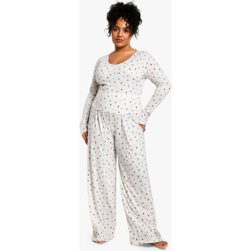 Set pigiama Plus Size natalizio con pantaloni e fiocco - boohoo - Modalova