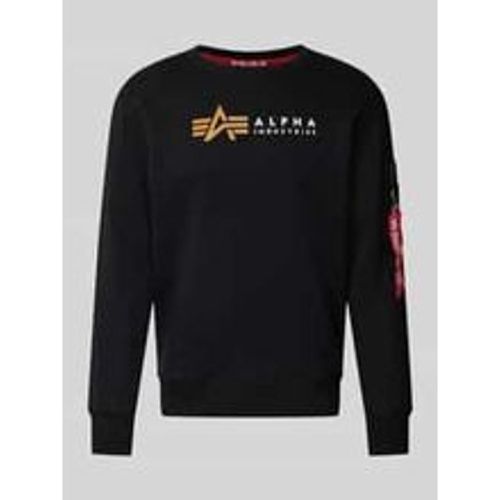 Sweatshirt mit Label-Print und Reißverschlusstasche - alpha industries - Modalova