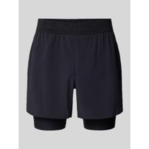 Shorts im 2-in-1-Look mit elastischem Bund - Under Armour - Modalova