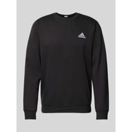 Sweatshirt mit Label-Detail - adidas Sportswear - Modalova