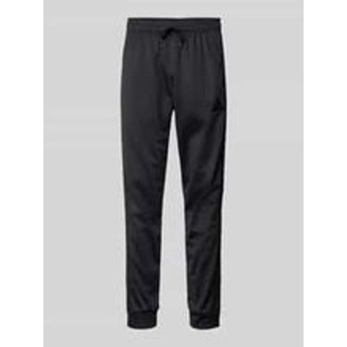 Slim Fit Sweatpants mit Tunnelzug - adidas Sportswear - Modalova