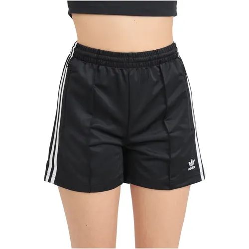 Schwarze Firebird Shorts mit Seitenstreifen , Damen, Größe: XS - adidas Originals - Modalova