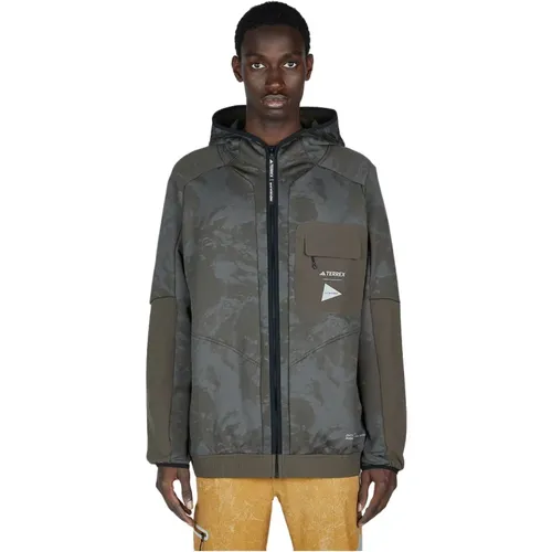 Abenteuerbereite Jacke mit grafischem Druck und Kapuze , Herren, Größe: XS - Adidas - Modalova