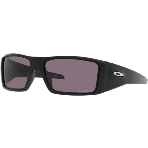 Heliostat Sonnenbrille in Mattschwarz - Oakley - Modalova