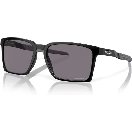 Schwarz/Grau Exchange Sun Sonnenbrille , unisex, Größe: 56 MM - Oakley - Modalova