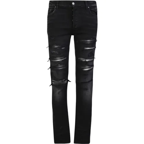 Schwarze Skinny Jeans mit Ripped Details - Amiri - Modalova