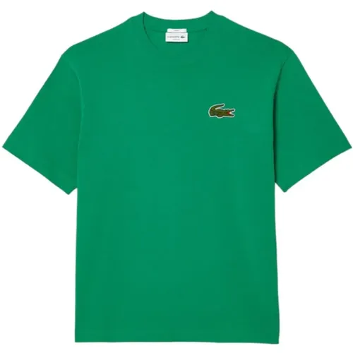 Grünes T-Shirt und Polo Loose Fit , Herren, Größe: L - Lacoste - Modalova